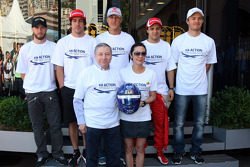 FIA photo, action for road safety. Nick Heidfeld, Lotus Renault GP, Fernando Alonso, Scuderia Ferrari, Michael Schumacher, Mercedes GP Petronas F1 Team, Felipe Massa, Scuderia Ferrari, Nico Rosberg, Mercedes GP Petronas F1 Team, Jean Todt, FIA president,