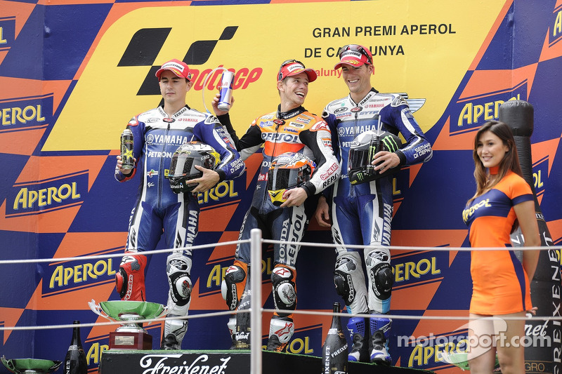 Podio: 1º Casey Stoner, 2º Jorge Lorenzo, 3º Ben Spies