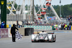Race winner Andre Lotterer takes the checkered flag