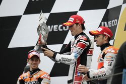 Podium: 1. Ben Spies, 2. Casey Stoner, 3. Andrea Dovizioso