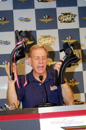 Robert Hubbard displays two types of HANS devices