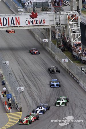 Early race action: Adrian Fernandez in front of Michael Andretti