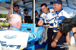 Paul Tracy celebrates pole with Player's team members