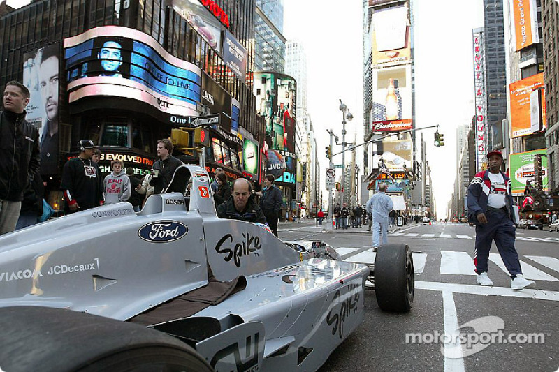 Ryan Hunter-Reay waits in the two-seater Champ Car for the next shoot