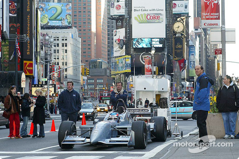 Ryan Hunter-Reay waits in the two-seater Champ Car for the next shoot