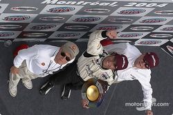 Podium: race winner Bruno Junqueira with Paul Newman and Carl Haas