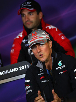 Michael Schumacher, Mercedes GP F1 Team, Timo Glock, Marussia Virgin Racing