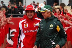 Fernando Alonso, Scuderia Ferrari, Heikki Kovalainen, Team Lotus