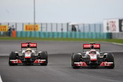 Льюис Хэмилтон, McLaren Mercedes и Дженсон Баттон, McLaren Mercedes