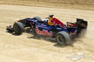 David Coulthard drives the Red Bull F1 car on the Circuit of the Americas in construction