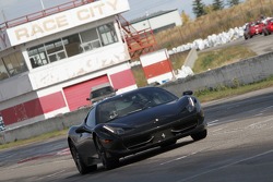 Damon Ockey drives his Ferrari 458 Italia