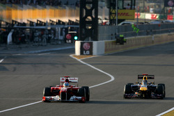 Fernando Alonso, Scuderia Ferrari and Sebastian Vettel, Red Bull Racing