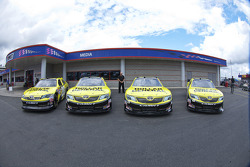 Dollar General unveils 4 cars in front of the media center