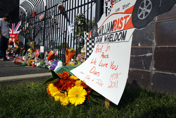 Fans pay tribute to Dan Wheldon at the Indianapolis Motor Speedway gates