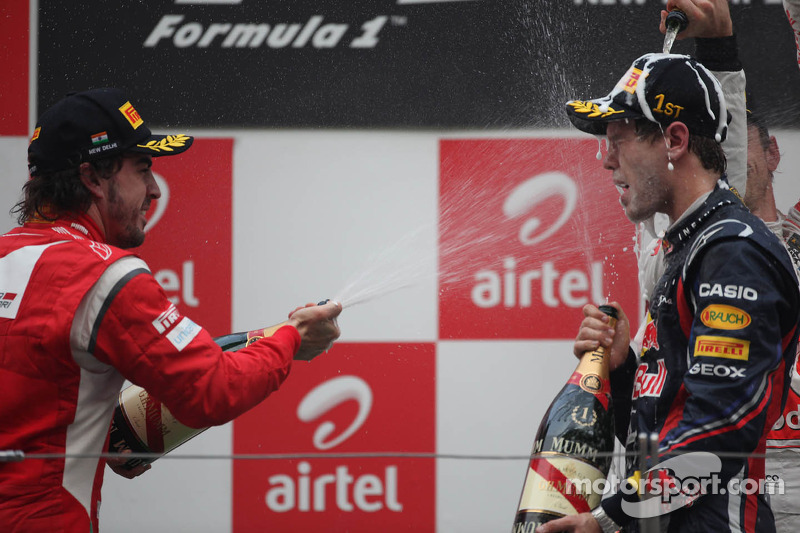 Podium: Fernando Alonso, Scuderia Ferrari and Sebastian Vettel, Red Bull Racing