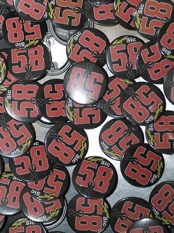 Marco Simoncelli badges in the media centre