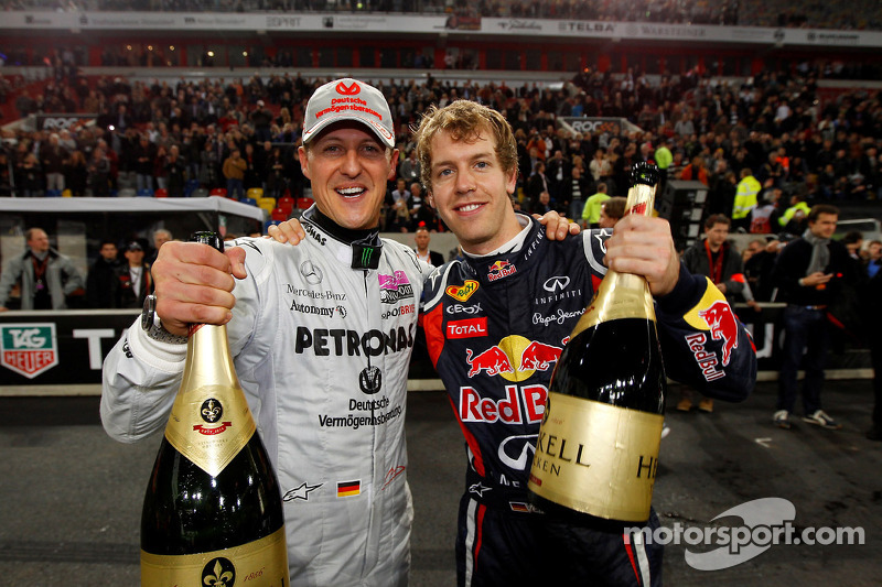 Winners Sebastian Vettel and Michael Schumacher