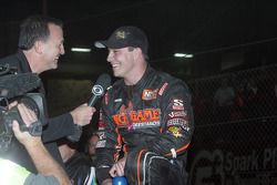 Kevin Swindell celebrates winning the 26th Lucas Oil Chili Bowl