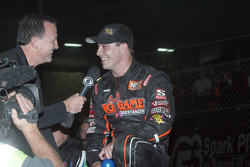 Kevin Swindell celebrates winning the 26th Lucas Oil Chili Bowl