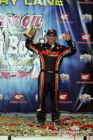 Kevin Swindell celebrates winning the 26th Lucas Oil Chili Bowl