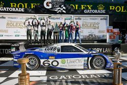 Victory lane: DP class and overal winners A.J. Allmendinger, Oswaldo Negri, John Pew and Justin Wilson, GT class winners Andy Lally, Richard Lietz, John Potter, Rene Rast