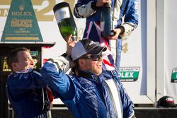 DP podium: A.J. Allmendinger celebrates with Michael Shank