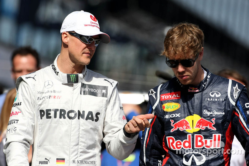 Michael Schumacher, Mercedes GP and Sebastian Vettel, Red Bull Racing