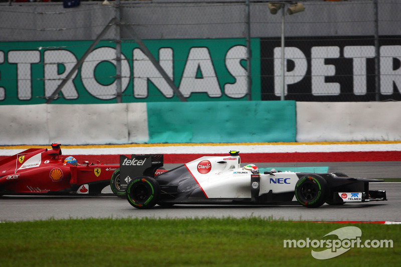 Fernando Alonso, Scuderia Ferrari en Sergio Perez, Sauber F1 Team