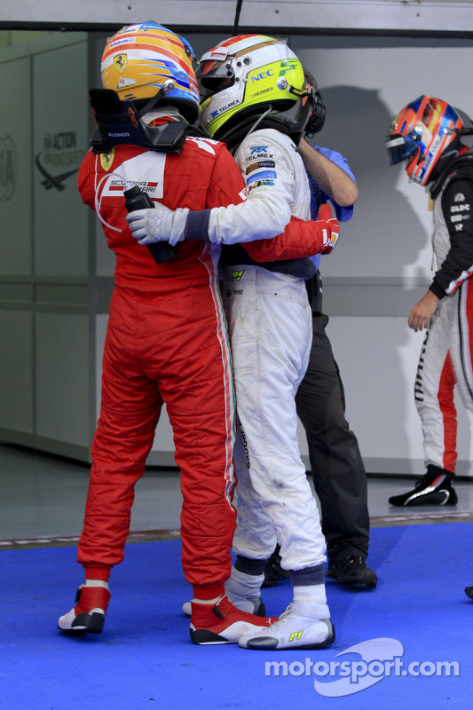Ganador Fernando Alonso, Scuderia Ferrari y segundo lugar Sergio Pérez, Sauber F1 Team