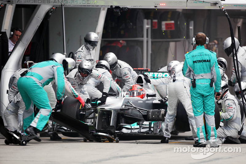 Michael Schumacher, Mercedes AMG F1 makes a pit stop that led to his retirement when a wheel was not securely attached to the car