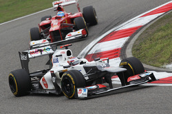 Kamui Kobayashi, Sauber y Fernando Alonso, Ferrari