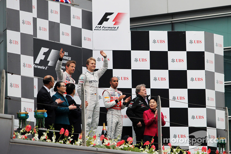 Podium: race winner Nico Rosberg, Mercedes AMG F1, second place Jenson Button, McLaren, third place 