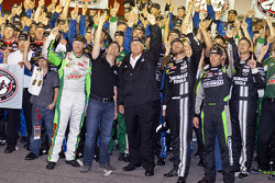 Race winner Jimmie Johnson and the rest of the Hendricks Motorsport crew celebrate 200 wins