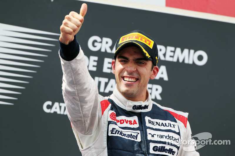 Race winner Pastor Maldonado, Williams F1 Team celebrates on the podium