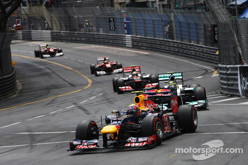 Mark Webber, Red Bull Racing leads the race from Nico Rosberg, Mercedes AMG F1