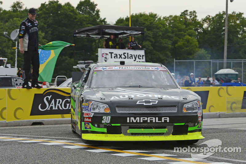 Race winner Nelson Piquet Jr. celebrates