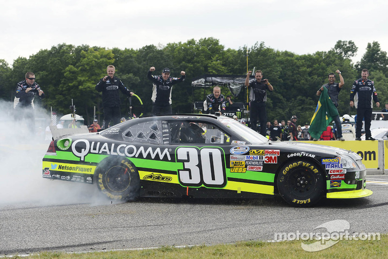 Race winner Nelson Piquet Jr. celebrates