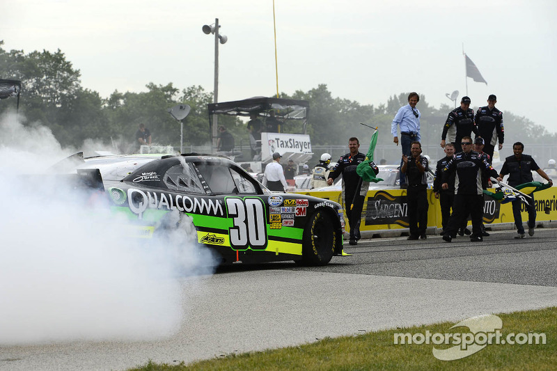Race winner Nelson Piquet Jr. celebrates
