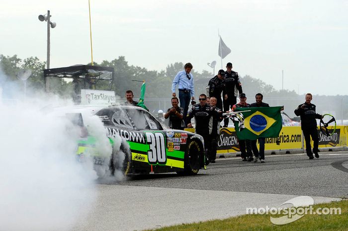 Race winner Nelson Piquet Jr. celebrates