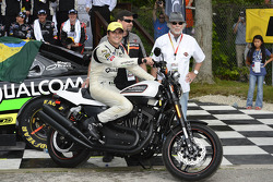 Victory lane: race winner Nelson Piquet Jr. celebrates