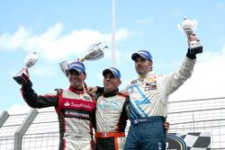 Victory lane: winner Eric Helary, second place Ander Vilarino, third place Yvan Muller