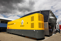 Red Bull Racing Comms Unit and Renault F1 Sport Truck with some dark clouds hanging over it