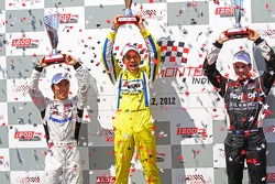 Victory lane: second place Takuma Sato, Rahal Letterman Lanigan Honda and third place Will Power, Verizon Team Penske Chevrolet
