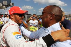 Lewis Hamilton, McLaren celebrates his pole position in parc ferme with father Anthony Hamilton