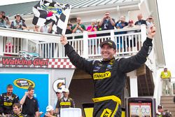 Victory lane: winner Marcos Ambrose celebrates