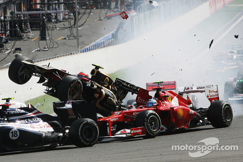 A crash at the start involving Lewis Hamilton, McLaren, Romain Grosjean, Lotus F1, Fernando Alonso, Ferrari, Kamui Kobayashi, Sauber