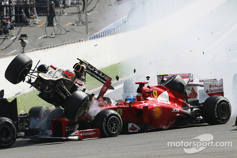 A crash at the start involving Lewis Hamilton, McLaren, Romain Grosjean, Lotus F1, Fernando Alonso, Ferrari, Kamui Kobayashi, Sauber