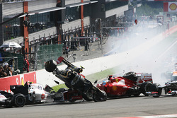 A crash at the start involving Lewis Hamilton, McLaren, Romain Grosjean, Lotus F1, Fernando Alonso, Ferrari, Kamui Kobayashi, Sauber