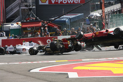 A crash at the start involving Lewis Hamilton, McLaren, Romain Grosjean, Lotus F1, Fernando Alonso,
