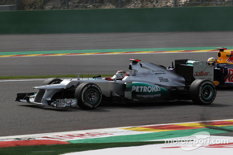 Michael Schumacher, Mercedes AMG Petronas y Sebastian Vettel, Red Bull Racing